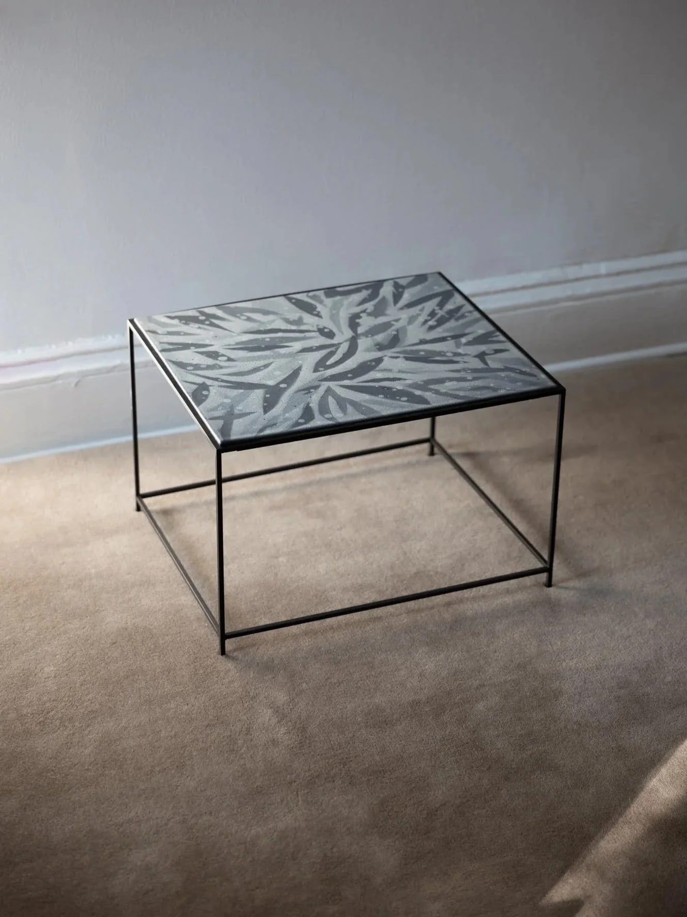 Side table with patterned tile