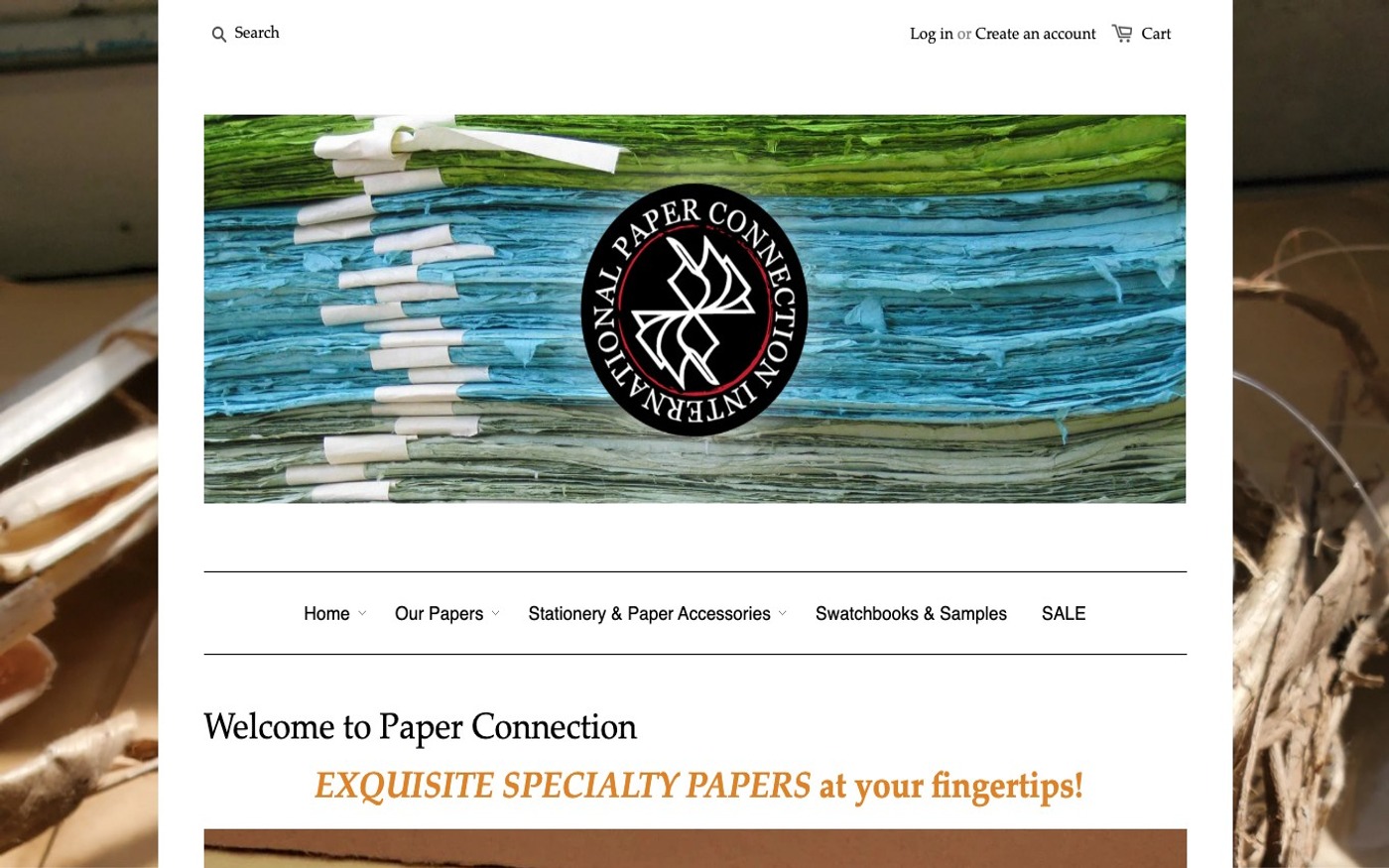 Captura limpia de la home oficial de Paper Connection